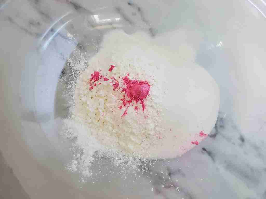 mixing the dry ingredients for a bath bomb