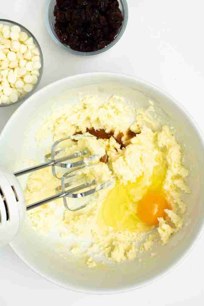 Adding egg to the cookie mix